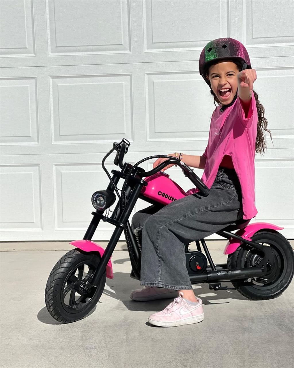 Moped with training wheels for young motorcycle enthusiasts