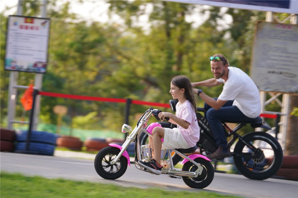 Kid Riding Motorcycle with Dad